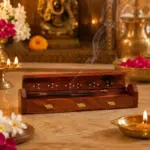 Wooden incense holder designed to support an agarbatti stick and catch ash