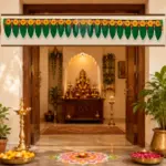 Plain green artificial mango leaf toran for a doorway