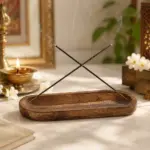 Long wooden incense tray designed to catch falling ash