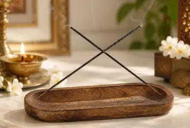 Long wooden incense tray designed to catch falling ash