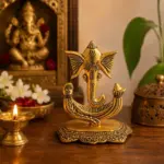 Compact Ganesh decorative plate with antique-gold-coloured finish
