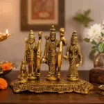 Gold-coloured Ram Darbar composition for a home mandir shelf