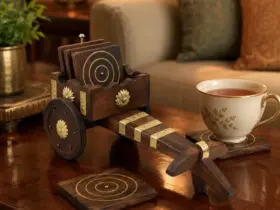 Wooden tea coaster set in a decorative bullock-cart holder